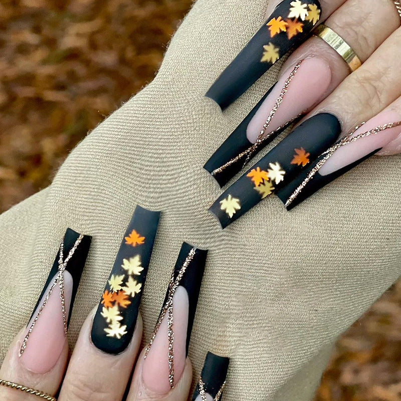 long-ballet-sweet-cool-black-gold-french-striped-maple-leaf-nail-art-noble-atmospheric-ins-wind-wearing-nail-art-nail-art